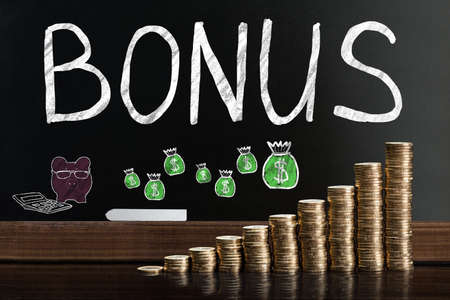 Bonus And Employee Compensation Concept On Blackboardの写真素材