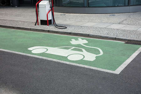 Charging area for electric cars on streetの写真素材