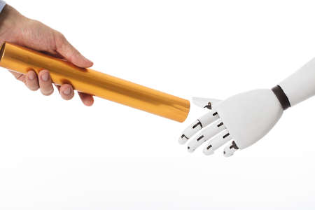 Close-up Of Robot Hand Giving Golden Baton To Businesspersonの写真素材