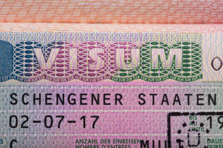 Elevated View Of Visum Text On Passport. German Schengen Visaの写真素材