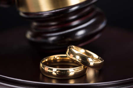 Close-up Of Golden Wedding Rings In Courtroomの写真素材