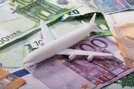 Close-up Of White Airplane On Euro Banknotesの写真素材