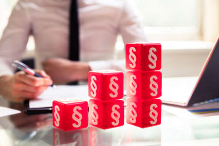 Increasing Graph Made Of Red Cubic Blocks With Paragraph Symbolsの写真素材