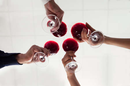 Close-up Of Friends Toasting Wineglasses At Partyの写真素材