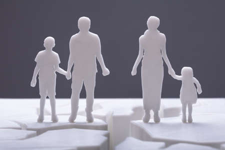 Photo Of Family Silhouette Separated By Cracked Surface
