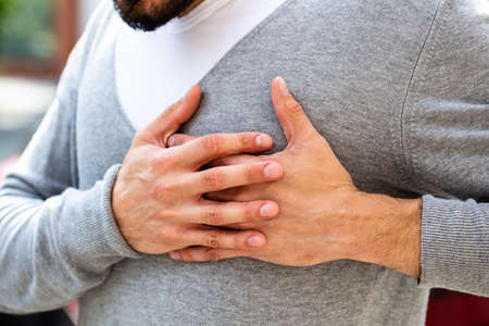Close-up Of A Man Having Pain In His Chest