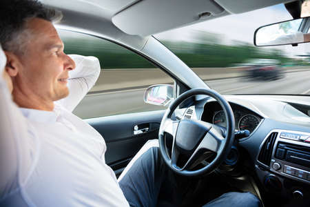 Close-up Of A Man Sitting In Self Driving Car