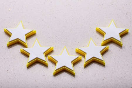 Elevated View Of Five Star Rating Icon On Backgroundの写真素材
