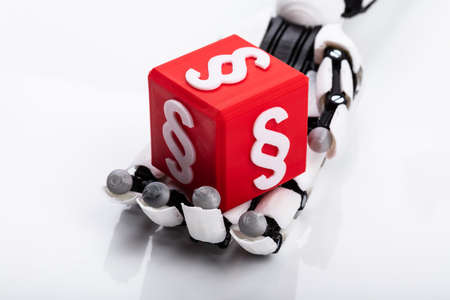 Robotic Hand Holding Red Cubic Block With Paragraph Symbol On Gray Background