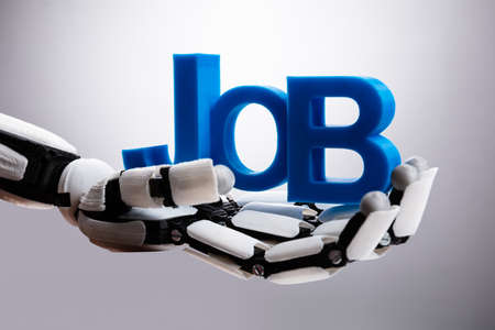 Robot Holding Blue Job Word On Gray Backgroundの写真素材