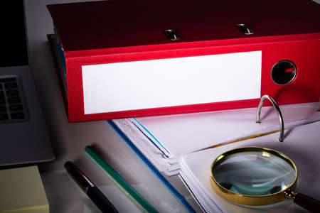 Office Workplace With Laptop And Folders On White Table