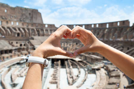 Woman Making Heart Shape In Inside Of Colosseum, Italy