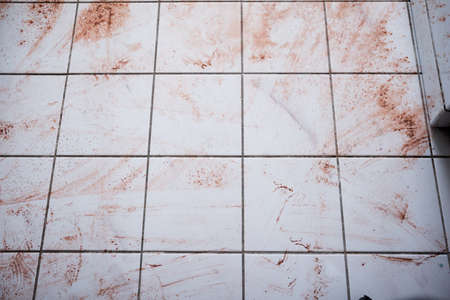 Tiled Floor With Spilled Food In Kitchenの写真素材