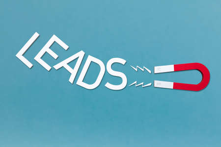 An Elevated View Of Magnet Attract The White Text Leads On Blue Backdropの写真素材