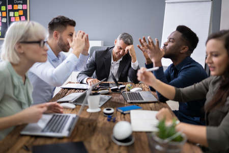 Frustrated Businessman During A Business Meeting In Office