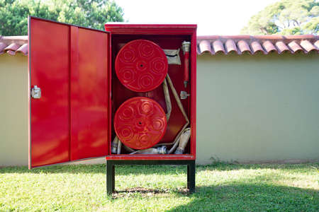 Fire Hose Reel Outdoors. Fire Safety Concept
