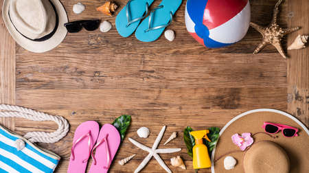 Sunbathing Travel Beach Accessories On Wooden Surfaceの写真素材