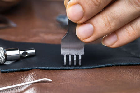 Cobbler Working With Leather. Leather Craft Tools.の写真素材