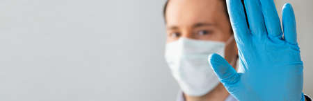 Man Making Coronavirus Pandemic Stop Hand Gesture