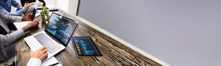 Group Doing Financial Business Analytics On Computerの写真素材