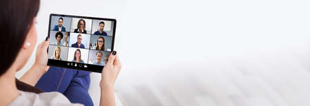Woman In Video Conferencing Call On Tablet. Webinar Conference