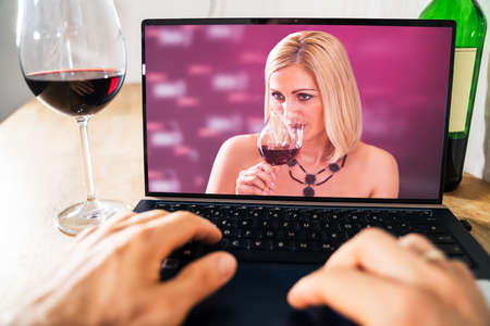 Virtual Wine Tasting By Friends Over Internet Using Video Conferenceの写真素材