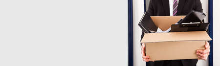 Fired From Job Businessman Employee With Box Movingの写真素材