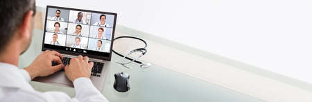 Doctors Video Conferencing And Learning Online On Computer
