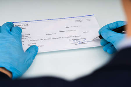 Writing Payroll Compensation Check And Stimulus Cheque