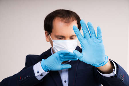 Man In Mask Suffering From Panic Attack And Shortness Of Breath