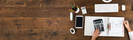Invoice And Calculator At Desk. Accounting And Auditの写真素材