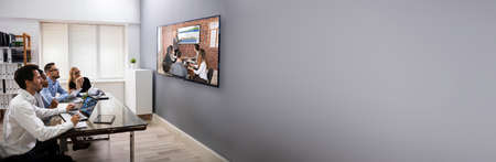 Watching Business Video Conference Call On TV