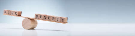 Risk Benefit Balance. Managing Reward On Scale