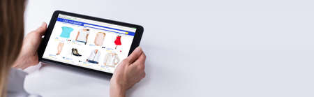 Online Shopping And Ecommerce. Woman Tablet Holdingの写真素材