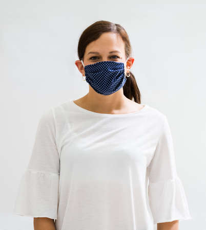 Woman In Reusable Cloth Face Mask. Covid-19 Quarantine Fashionの写真素材
