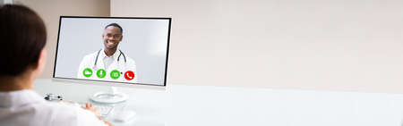 Medical Doctor Holding Online Elearning Video Conferenceの写真素材