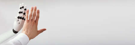 Man Robot Interaction. Human And Machine With Artificial Intelligenceの写真素材