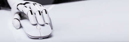 AI Robot Hand With Computer Mouse. Artificial Intelligenceの写真素材