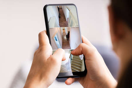 Security Camera Surveillance Video On Phone Screenの写真素材