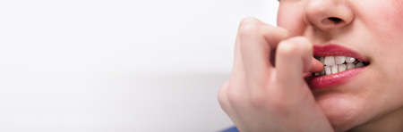 Neurotic Fingernails Biting. Nervous Woman Mouth. Female Trouble