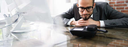 Waiting Landline Telephone Call At Office Desk