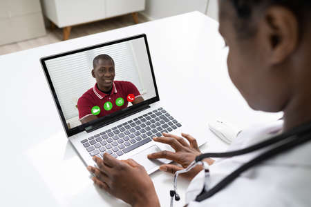 African Doctor In Video Conference Call Talking With Patient
