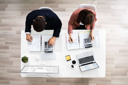 Auditors Calculating Corporate Invoicing And Tax Budgetの写真素材