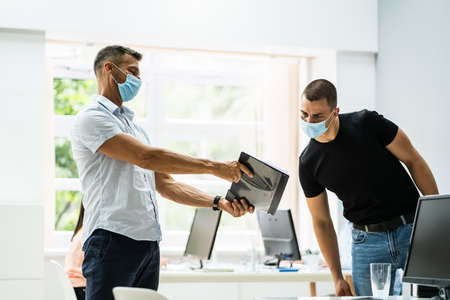 Business Team Meeting Or Presentation With Social Distancingの写真素材