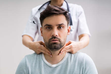 Patient Lymph Examination Using Palpation By Physician Doctorの写真素材