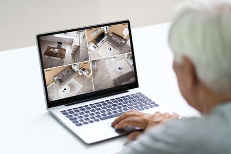 CCTV Security Camera Surveillance Footage On Laptop
