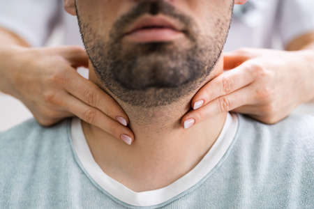 Patient Lymph Examination Using Palpation By Physician Doctorの写真素材