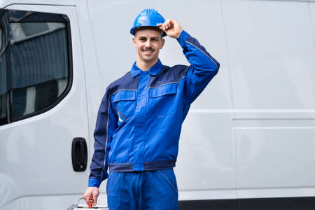 Happy Electrician Or Plumber With Toolbox Near Van Vehicle