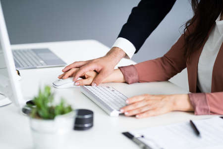 Sexual Harassment At Workplace. Woman Being Harassedの写真素材