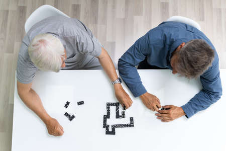 Elder Old Senior Playing Domino Table Game